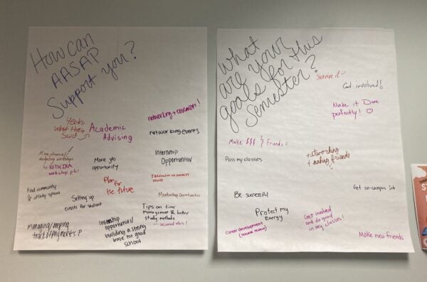 At the OSSB & AASAP Open House, two sheets of paper asking questions of students filled with answers from students about how they want to be supported, and what their semester goals are.